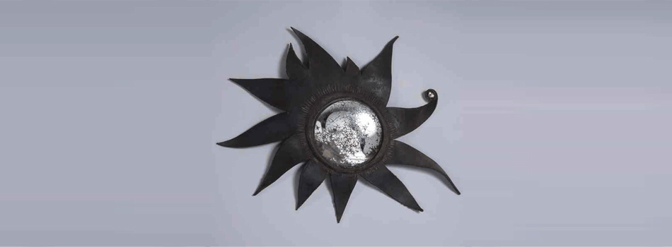 Line VAUTRIN • Miroir modèle Folie ou Le soleil à rendez-vous avec la lune en talosel noir, Vers 1958.